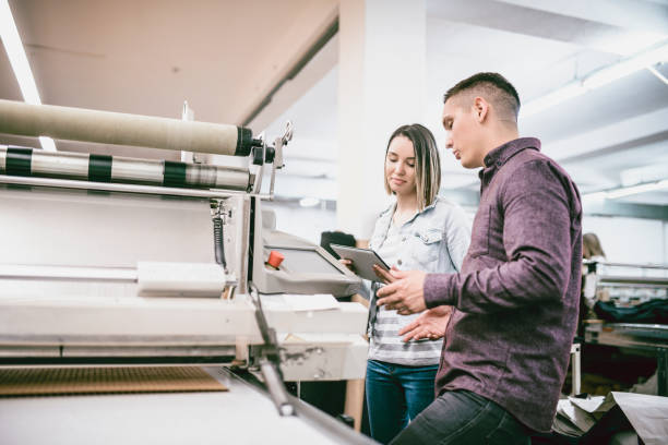 Team Working in Textile Factory on 3D Clothing Printing