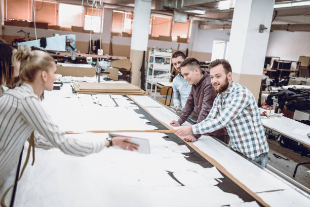 istock Small Meeting About the New Project in Textile Factory 948302438