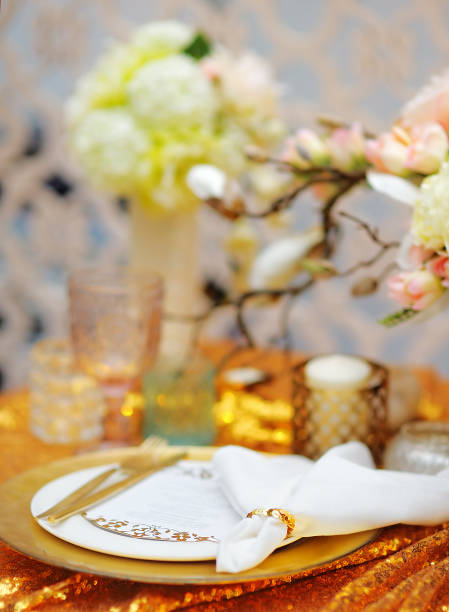 istock Stylish gold table set with natural flowers 948305200