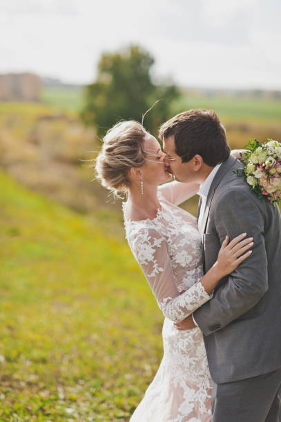 istock Newlyweds on the background of Russian fields 103. 948317054