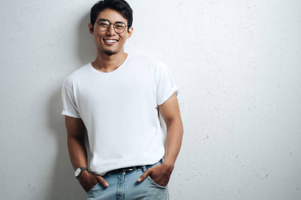 istock Handsome asian man in white blank t-shirt 948329116
