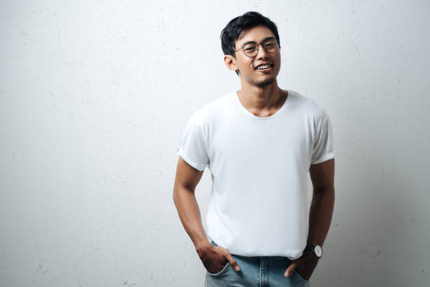 istock Handsome asian man in white blank t-shirt 948331360