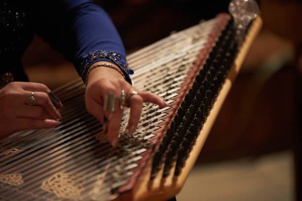istock Woman Hands playing on a harp 948334206
