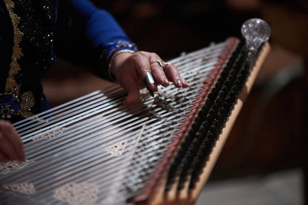 istock Woman Hands playing on a harp 948334362