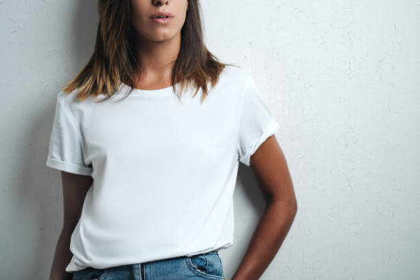istock white blank t-shirt, woman model close-up 948336748
