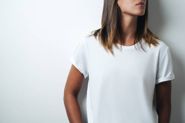 istock white blank t-shirt, woman model close-up 948336752