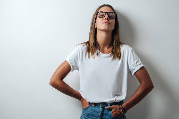 istock Handsome woman in white blank t-shirt, studio model 948337338