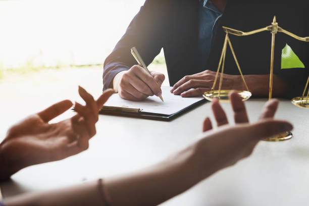 istock The client explained to the lawyer to plan the case in court. 948340018