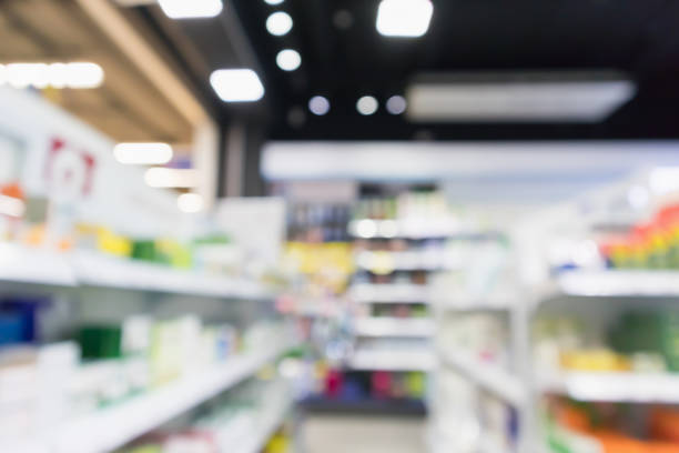 istock pharmacy drugstore shop interior blur background 948340226