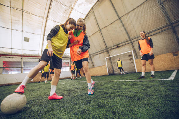 istock Women playing soccer 948355598