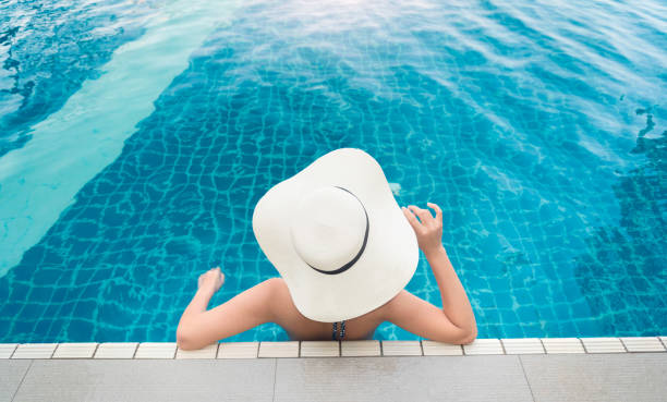 istock Back view young asian woman relaxing 948369522