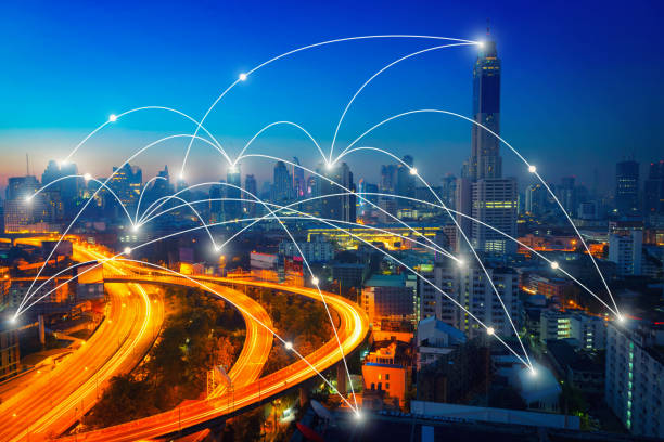istock Network connection line between building over of cityscape 948369758