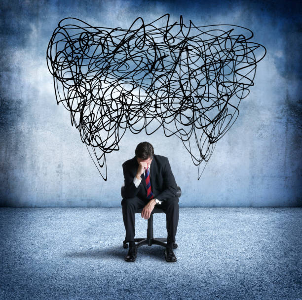 istock Distressed Man Sitting In Chair 948374962