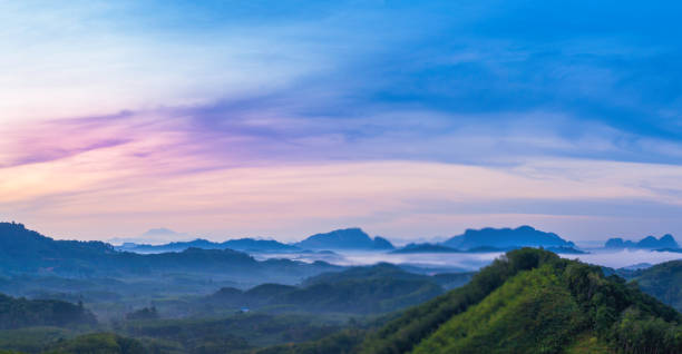 istock sunrise in Phang Nga valley on Phu Tathan hilltop 948380210