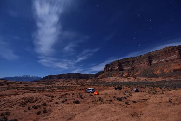 istock Car Camping under the moonlight, Glen Canyon, Utah 948380352