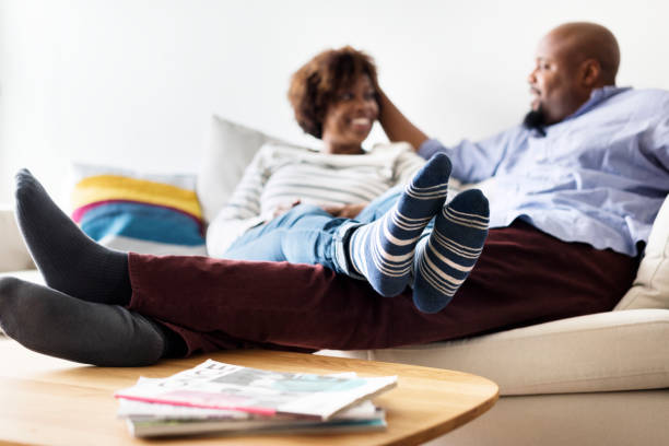istock Happy couple relaxing at home 948387538