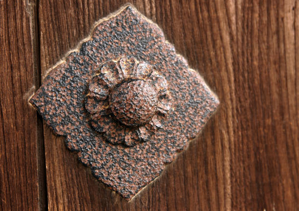 Japanese Traditional Decorative Iron Nail on Wood Panel stock photo