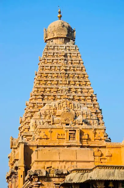 Carved Stone Gopuram of the Brihadishvara Temple, Thanjavur, Tamil Nadu, India. Hindu temple dedicated to Lord Shiva, it is one of the largest South Indian temple and an exemplary example of a fully realized Tamil architecture, built by Raja  Chola I between 1003 and 1010 AD. UNESCO World Heritage Site known as the Great Living Chola Temples