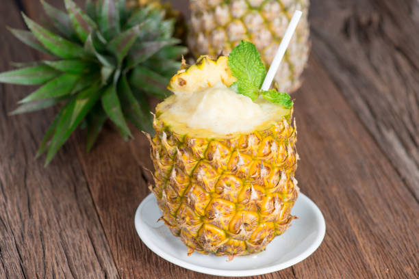 istock Tropical drink, Pineapple smoothie with fresh pineapple. 948404432