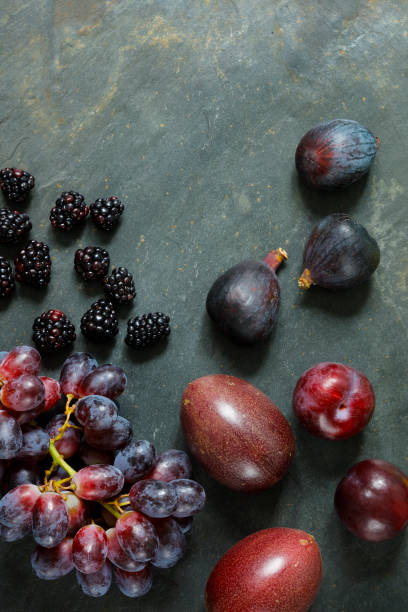 istock Dark Exotic Fruits on slate background 948407734