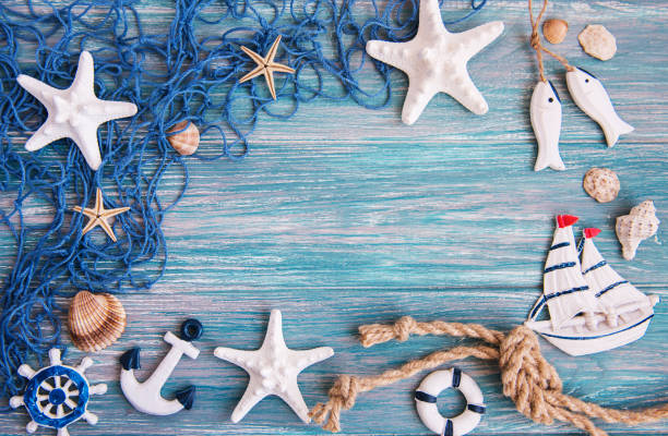 istock Fishing net with starfish and sea decorations 948408148