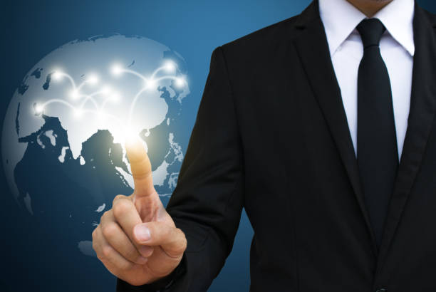 istock Businessman touching global  network. communication and social media concepts. 948408568