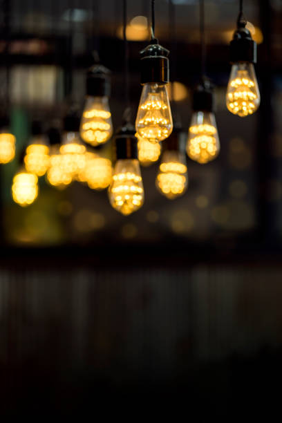 istock Blurred of Lighting lamp hanging decor from the ceiling with copy space. 948416042
