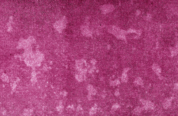 istock Old dirty cardboard surface in pink tone. 948417074