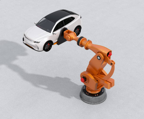 istock Orange heavyweight robotic arm delivering white SUV on concrete ground 948417724
