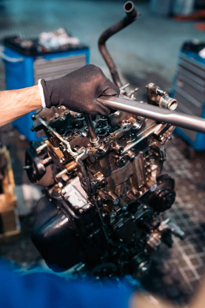 istock Professional Mechanic Repairing Car. 948417798