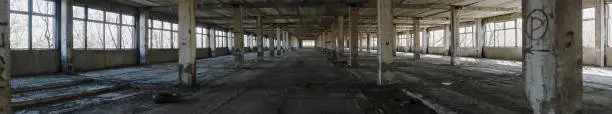 Panoramic shot of rustic abandoned factory