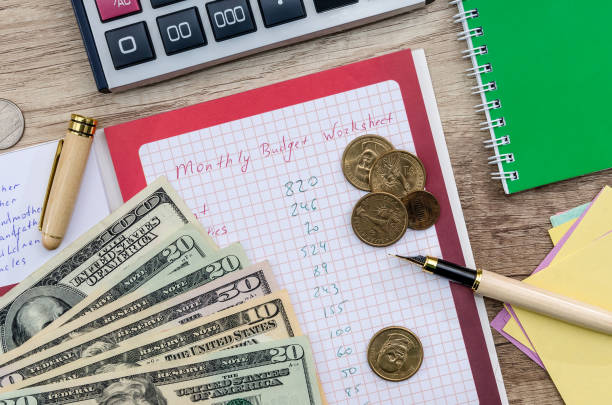 istock 'Monthly budget planning' concept on wooden table 948425056