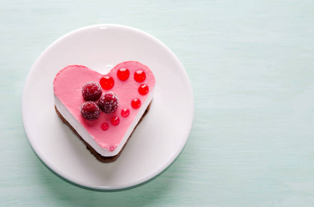 istock nice small cake in the form of heart  on the table 948426384