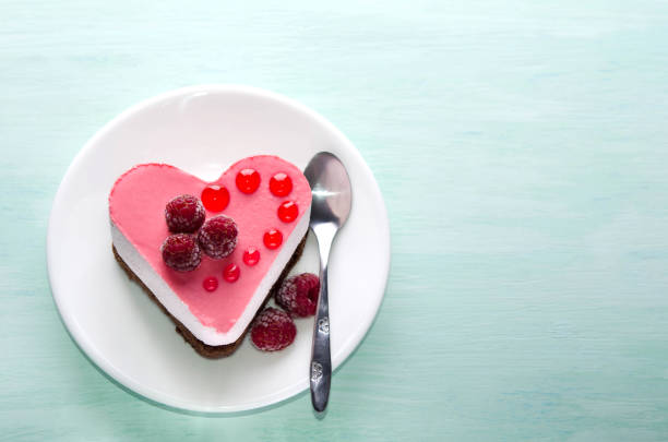 istock nice small cake in the form of heart  on the table 948426392