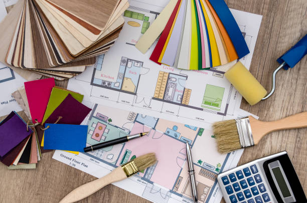 istock Color samples with home plan, brush and calculator 948426474