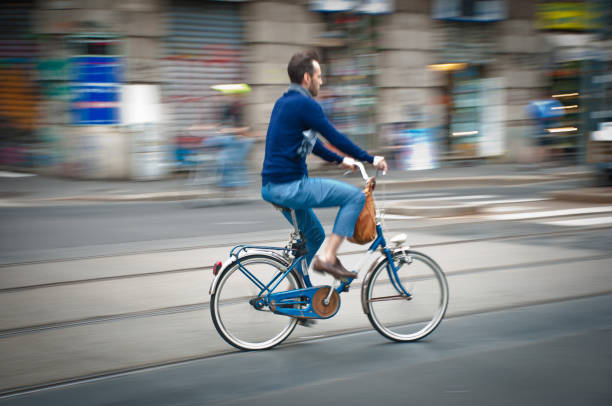 istock panning cyclist in the city 948430808