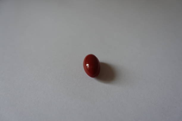 istock Single capsule of lutein dietary supplement 948431018