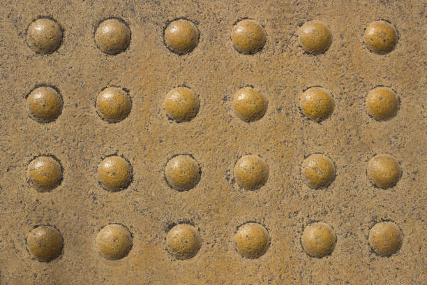 istock Tile in metro. Texture. With round protrusions .  Relief tactile tiles. 948431276
