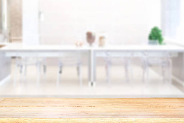 istock Empty wooden table space platform and blurred resturant background for product display montage 948431282