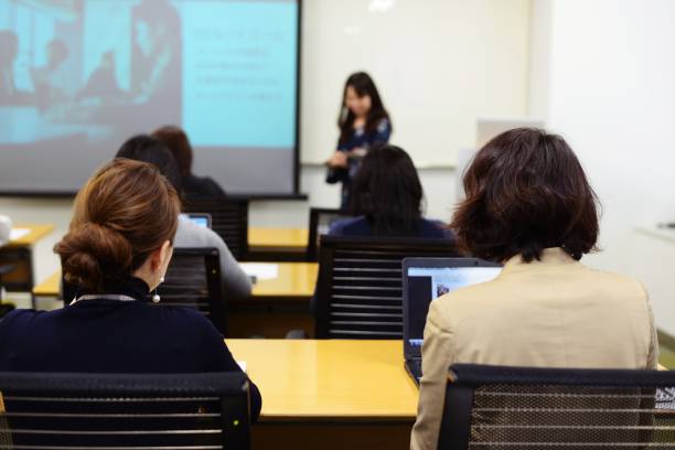 istock Professional women at seminar 948433664