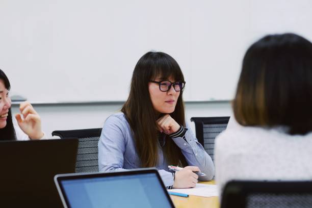 istock Professional women at a meeting 948433784