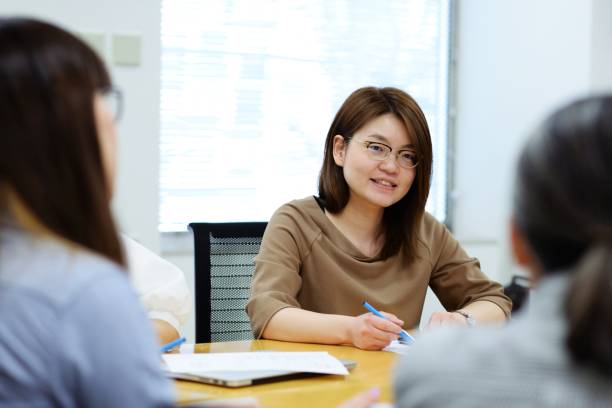 istock Professional women at a meeting 948434170