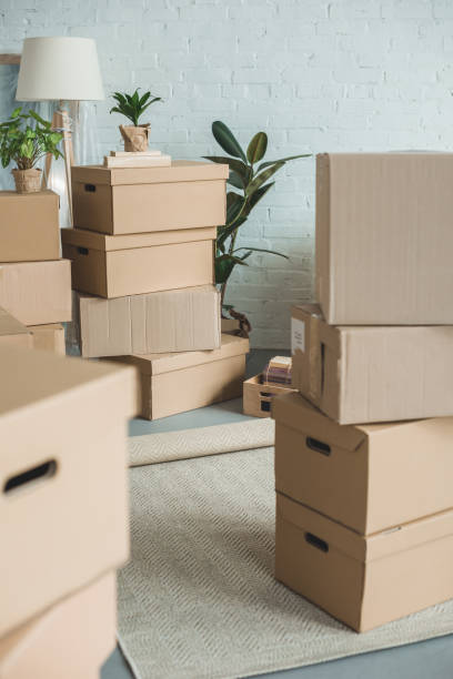 istock close up view of cardboard boxes in room 948448082