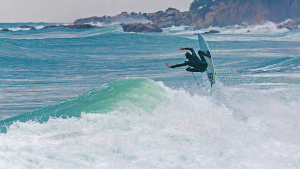 istock Surfer jumping on the big  wave in Costa Brava, Spain 948448806