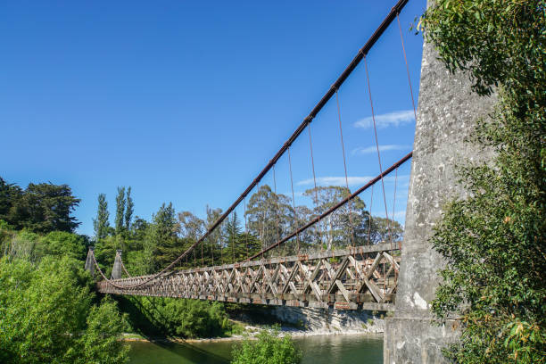 istock vintage wooden bridge across the river in deep blue sky 948454578