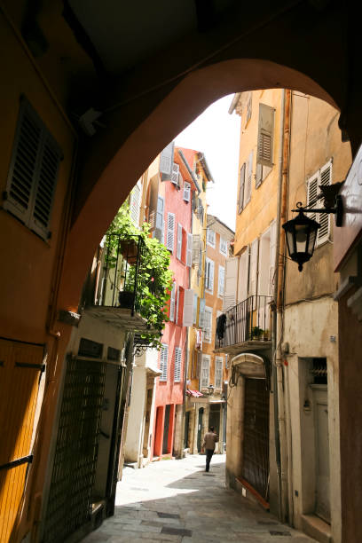 naroow back streets and colorful houses of the medieval city of grasse in the south of france