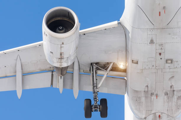 istock Jet engine with shiny metal, wing with flaps, lights rubber wheel chassis, close-up before landing at the airport. 948455502