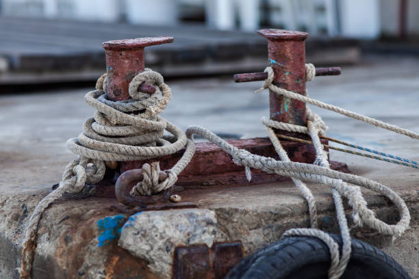istock Two-headed mooring bitt wrapped with rope 948456226