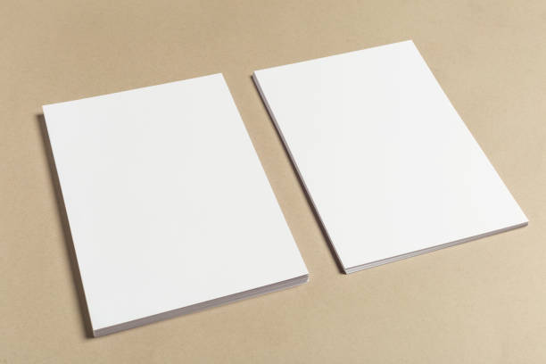 istock White business card on wooden table. Blank portrait A4. 948459896