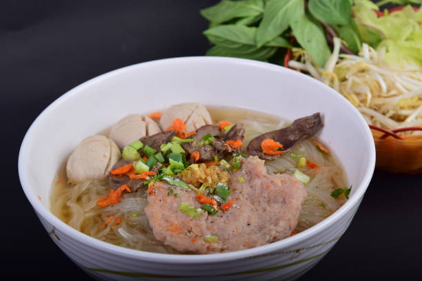 istock Pork rice noodle soup with meat ball and vegetable 948463616